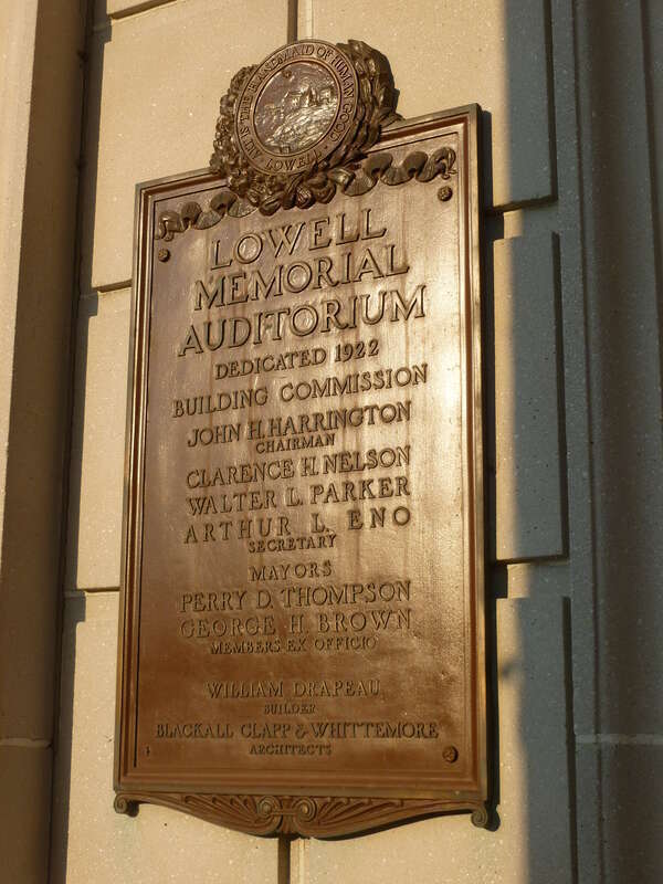 Dedication plaque of Lowell Memorial Auditorium.  Located on west (front) side of the building, at 50 East Merrimack Street, Lowell, Massachusetts.
