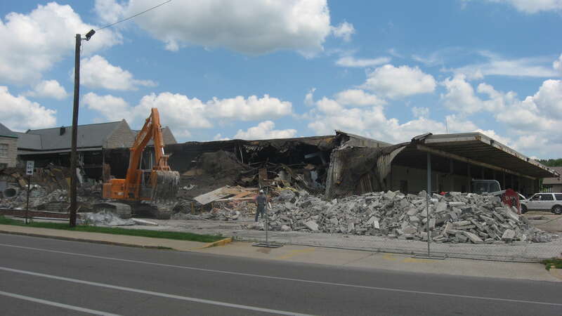 Demolition of the former Bloomington Main Post Office, which occupies the block surrounded by Fourth, Washington, Third, and Lincoln Streets in downtown Bloomington, Indiana, United States.  Built in 1959, the post office closed in 2011 (a new