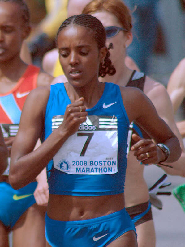 Picture of Dire Tune running in the Boston Marathon 2008 at Wellesley Square