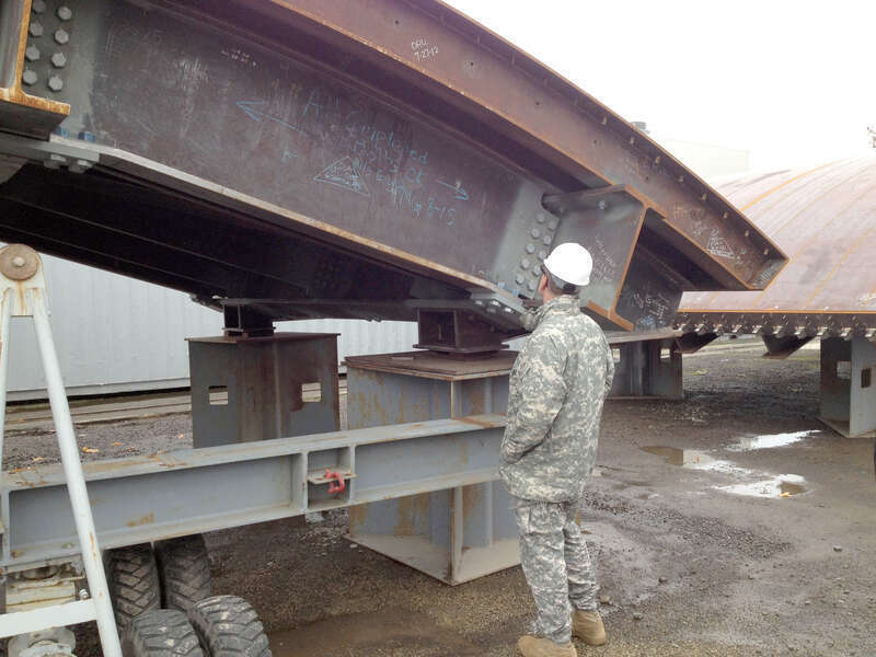 Col. Bill Leady, commander of the U.S. Army Corps of Engineers Sacramento District, takes a closer look at a tainter gate for the new Folsom Dam auxiliary spillway Nov. 28, 2012, at the Oregon Iron Works’ Vancouver, Wash., facility.
“Being [at the