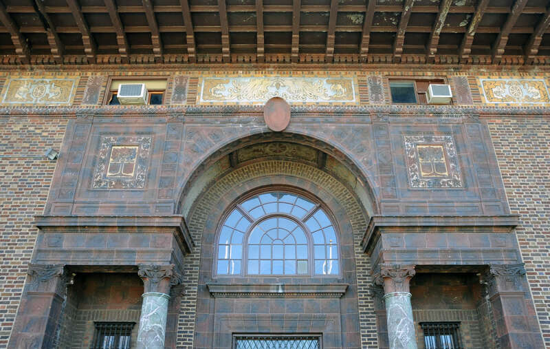 THIS IS A CLOSEUP OF THE FRONT OF THE BUILDING WHICH IS QUITE ORNATE AND POSSIBLY THE MAJOR REASON FOR ITS INCLUSION ON THE NATIONAL REGISTER