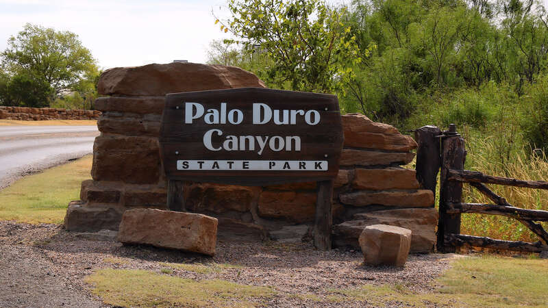 The park sign at the entrance to Palo Duro Canyon State Park in Randall County, Texas, United States.
