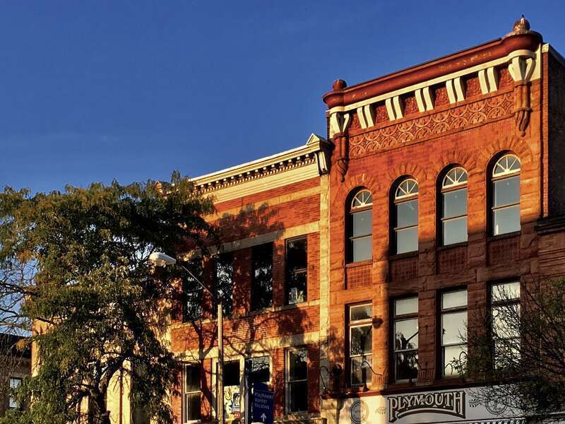 The Plymouth Tavern &amp;amp; Restaurant and adjacent period-style brick buildings along State Street between 11th and 12th Streets in downtown Erie, Pennsylvania.