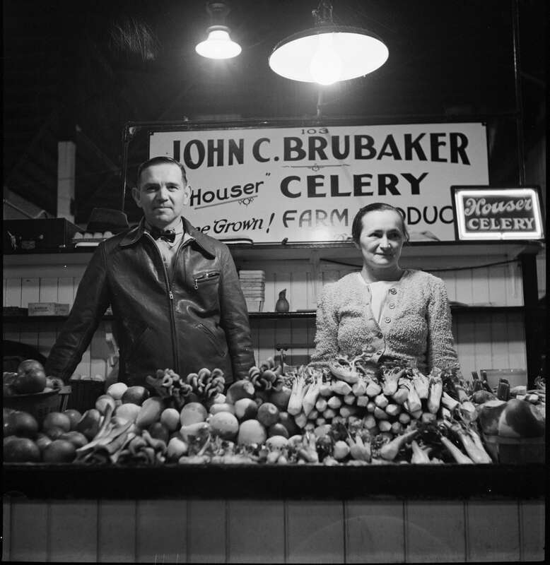 From Library of Congress metadata:
Title: Farmer and his wife at her stall in Central Market. Lancaster, Pennsylvania
Creator(s): Collins, Marjory, 1912-1985, photographer
Date Created/Published: 1942 Nov.
Medium: 1 negative : nitrate ; 2 1/4 x 2 1/4