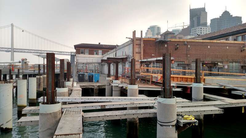 Ferry Terminal expansion in November 2018. Smoke from the Camp Fire is visible.