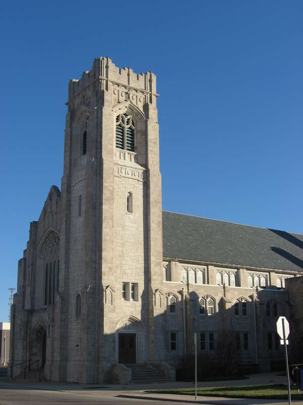 Front and western side of First Baptist Church, located at 309 E. Adams Street in Muncie, Indiana, United States.  Built in 1928, it is listed on the National Register of Historic Places.