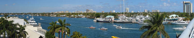 This panoramic photograph of the Fort Lauderdale harbor was taken from the 17th Street Bridge facing northeast toward the Harbor Beach area on the far side of the Intracoastal Waterway.