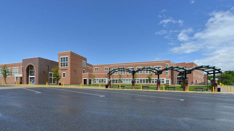 he Gymnasium side of Gaithersburg High School with the bus parking area, part of the Montgomery County Public School system. 101 Education Blvd, Gaithersburg, Maryland 20877.