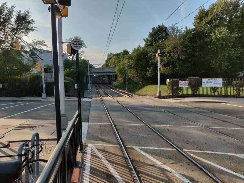 The Randolph Avenue crossing, and view of the Hudson Bergen Light Rail's Right-of-way on the west side of Garfield Avenue Station in Jersey City, New Jersey, USA.