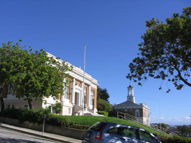 The Grand Avenue branch of the South San Francisco Public Library and the South San Francisco City Hall in California, USA, seen from Walnut Avenue near Grand Avenue.