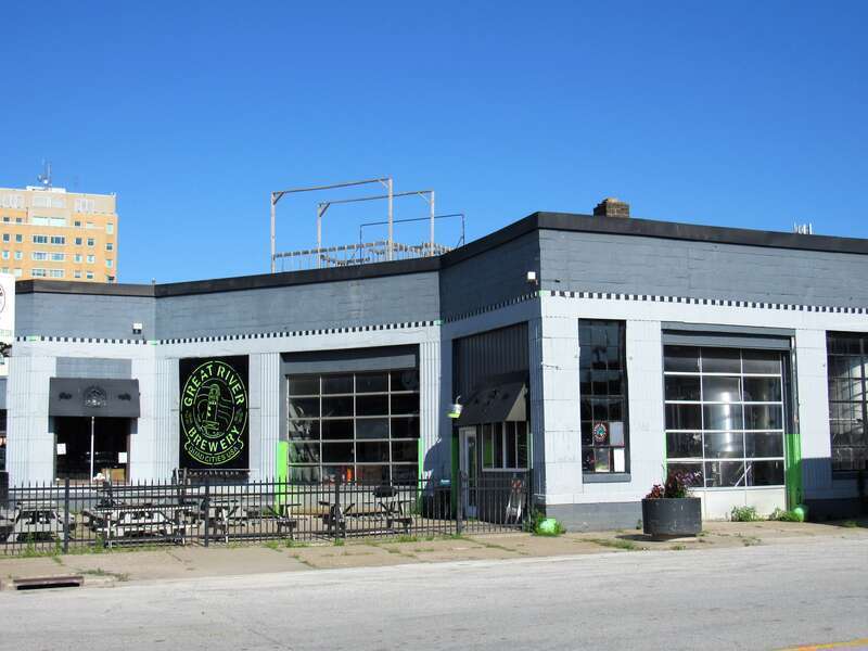 Great River Brewing Company in downtown Davenport, Iowa. The building is a contributing property in the Davenport Motor Row and Industrial Historic District. It initially housed a service station.