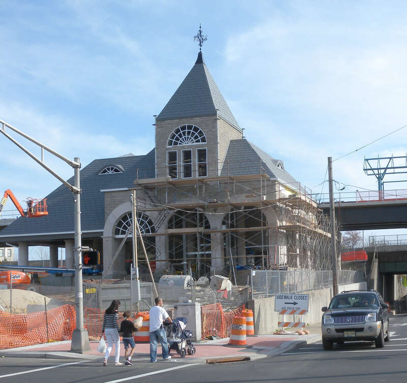 Looking southeast from Avenue C across 8th Street at new trolley terminal under construction on a sunny early afternoon.  See File:HBLR 8 St construction jeh.JPG for side view with sun.