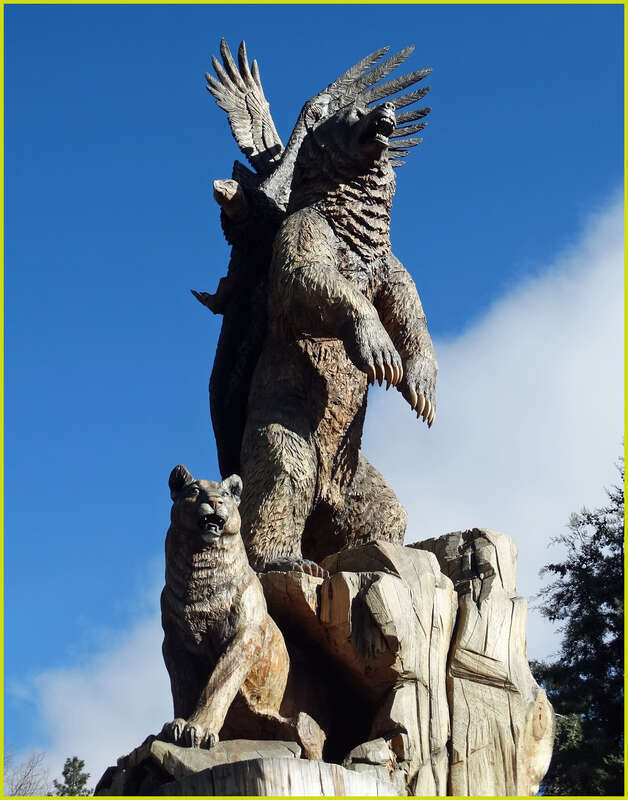 (1 in a multiple picture set)
This massive wood sculpture is called &quot;Harmony.&quot;  It shows all the different species of the nearby forest living together in peace.  It is the highlight of Idyllwild's Sculpture Garden at the center of the village.