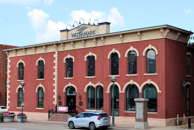 Historic Block in Downtown Moline, Illinois. This group of Italianate commercial buildings were built between 1876 and 1885. The building on the corner was originally three stories, but the third floor was removed after a fire in the 1960s.
