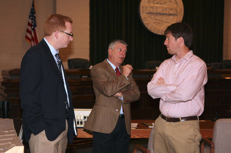 David Thomas (center), director of the Folsom Dam Joint Federal Project, and civil engineer Jeff Wisniewski (right), both with the U.S. Army Corps of Engineers Sacramento District, speak with Nathan Dietrich, from Congresswoman Doris Matsui’s office,