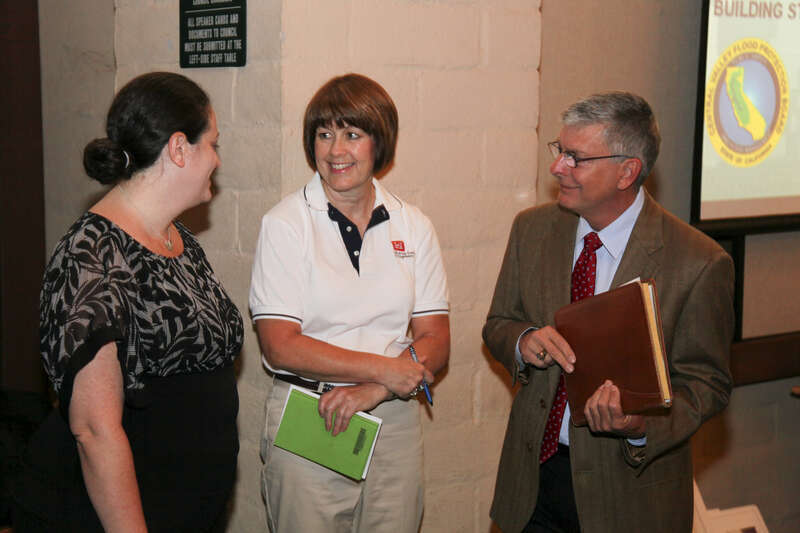 U.S. Army Corps of Engineers Sacramento District employees Beth Salyers (left), project manager, Sue Yarbrough (center), chief of contracting, and David Thomas, director of the Folsom Dam Joint Federal Project, speak during an Industry Day event June