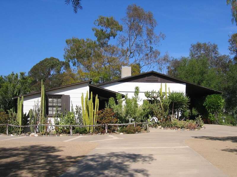 An exterior view of the Serrano Adobe facing northeast.
