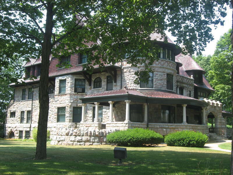 Front and eastern side of the Joseph D. Oliver House, located at 808 W. Washington Avenue in South Bend, Indiana, United States.  Built in 1895, it is listed on the National Register of Historic Places, and it is part of a Register-listed historic