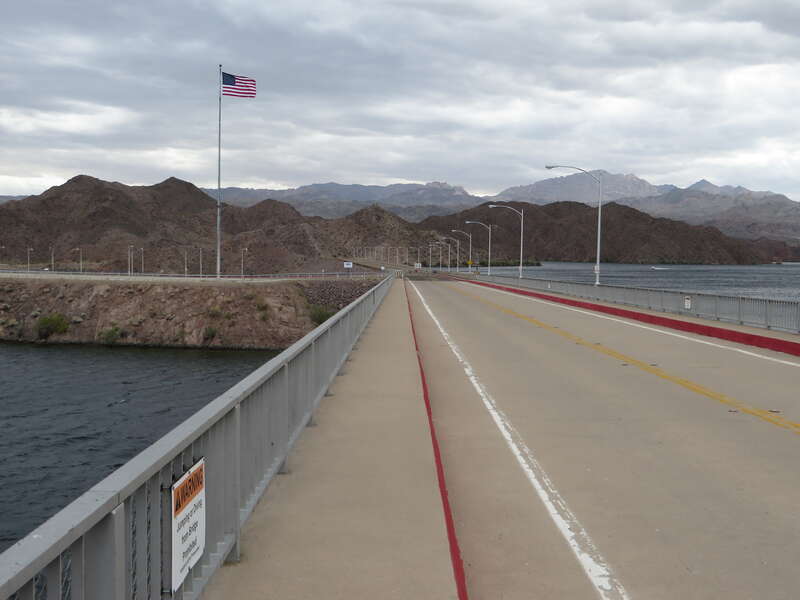 Davis Dam is a dam on the Colorado River about 70 miles (110 km) downstream from Hoover Dam. It stretches across the border between Arizona and Nevada. Originally called Bullhead Dam, Davis Dam was renamed after Arthur Powell Davis, who was the