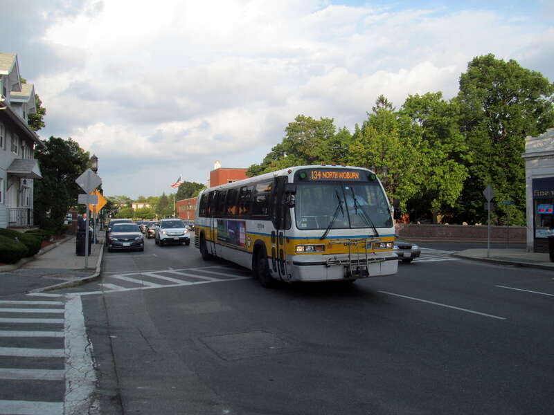An outbound MBTA #134 bus on Salem Street at Medford Square in July 2015