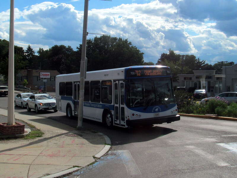 A #712 bus waits to turn from Revere Street onto Crest Avenue in July 2015