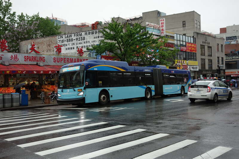 A Jamaica–Merrick Boulevard-bound Q44 SBS bus traveling south on Main Street at 41st Road in Downtown Flushing, Queens.