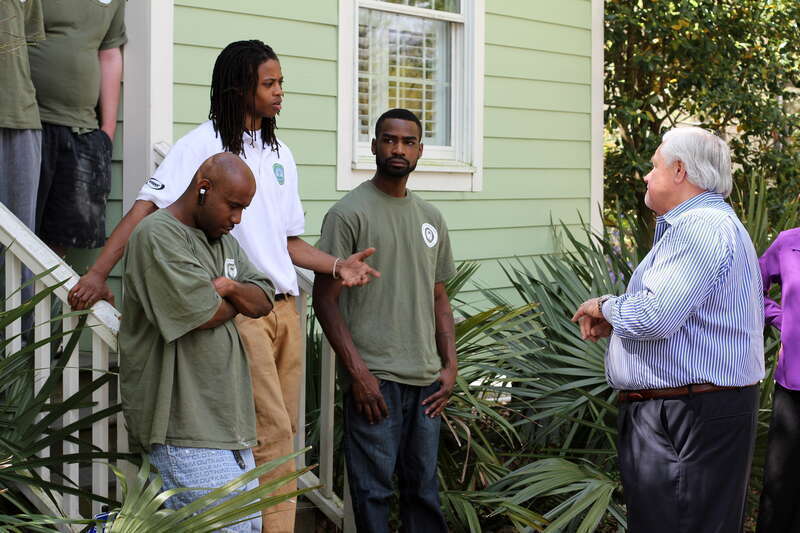 North Charleston Mayor R. Keith Summey visits with the Sustainability Institute's Energy Conservation Corps at their Green House on East Montague.

Photo by Ryan Johnson
