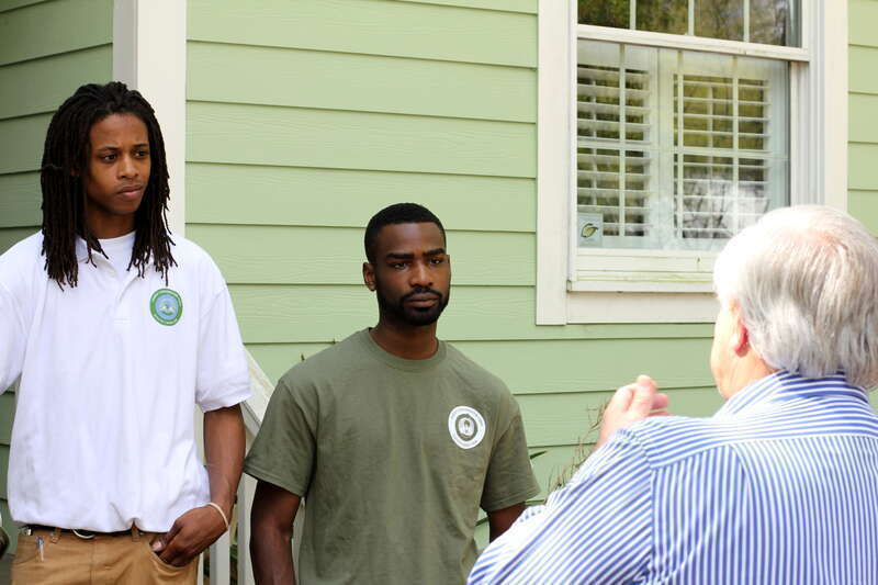 North Charleston Mayor R. Keith Summey visits with the Sustainability Institute's Energy Conservation Corps at their Green House on East Montague.

Photo by Ryan Johnson