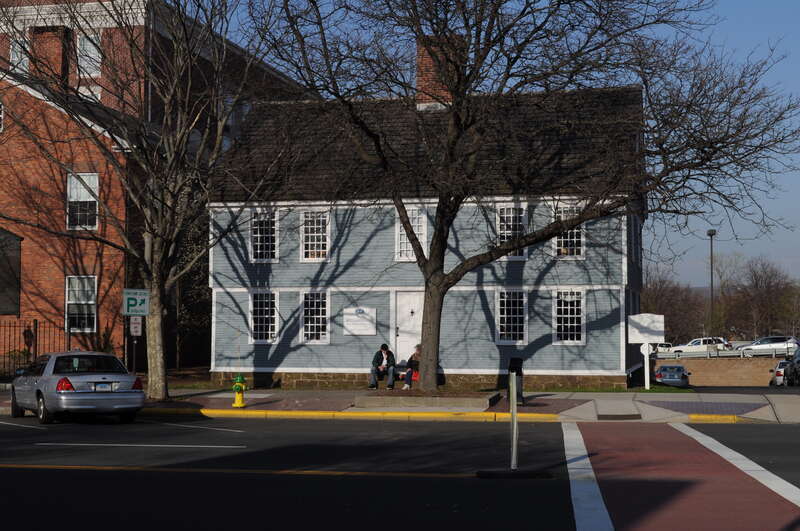 Charles Boardman House, 48 Main Street, Middletown, Connecticut, USA. A contributing property of the Metro South Historic District, which is on the National Register of Historic Places. Part of the Inn at Middletown (former State Armory) can be seen