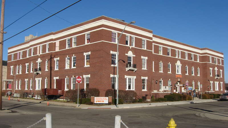 Front and western side of the Muncie YWCA, located at 310 E. Charles Street in Muncie, Indiana, United States.  Built in 1925, it is listed on the National Register of Historic Places.