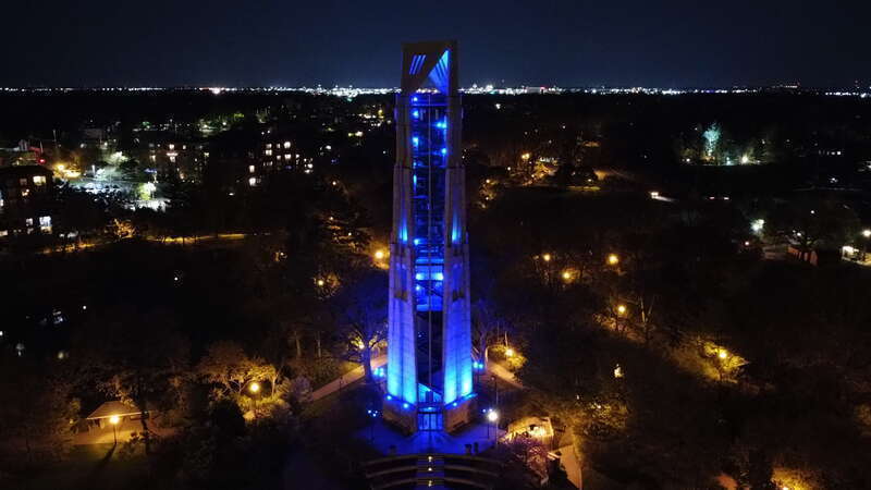 Moser Tower and Millennium Carillon in Naperville IL at night.