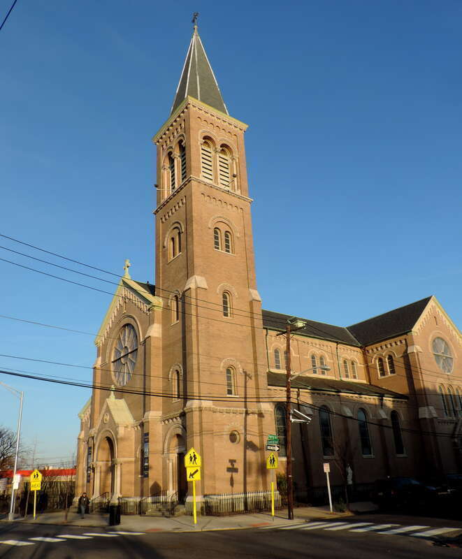 Looking east across Central Avenue and Ferry Street at St Nicholas Church, late on a sunny day