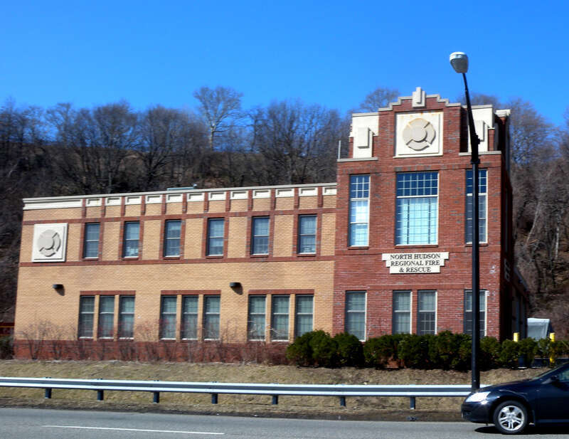 Looking west across River Road at North Hudson Fire and Rescue station on a sunny late morning.
