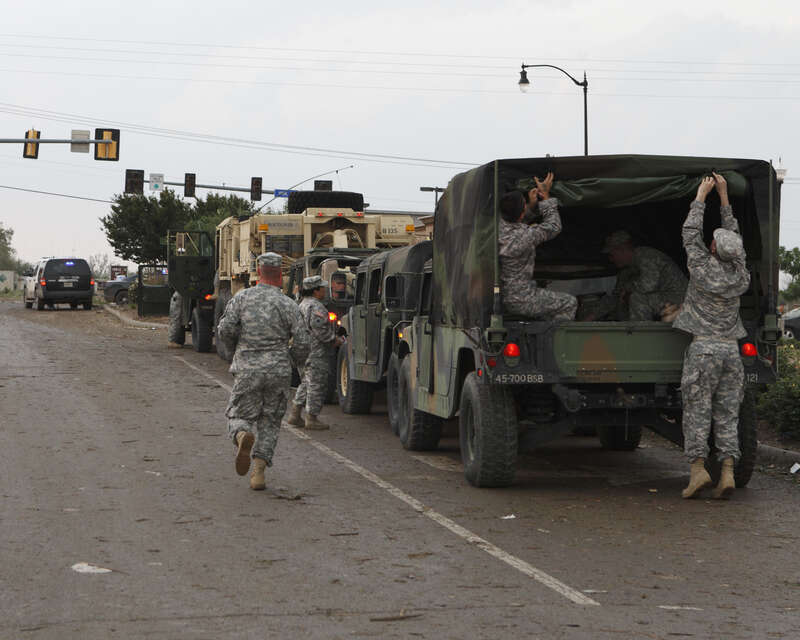 Oklahoma National Guard Soldiers and Airmen respond to a devastating tornado that ripped through Moore, Okla., May 20, 2013. (Photo by Sgt. 1st Class Kendall James)