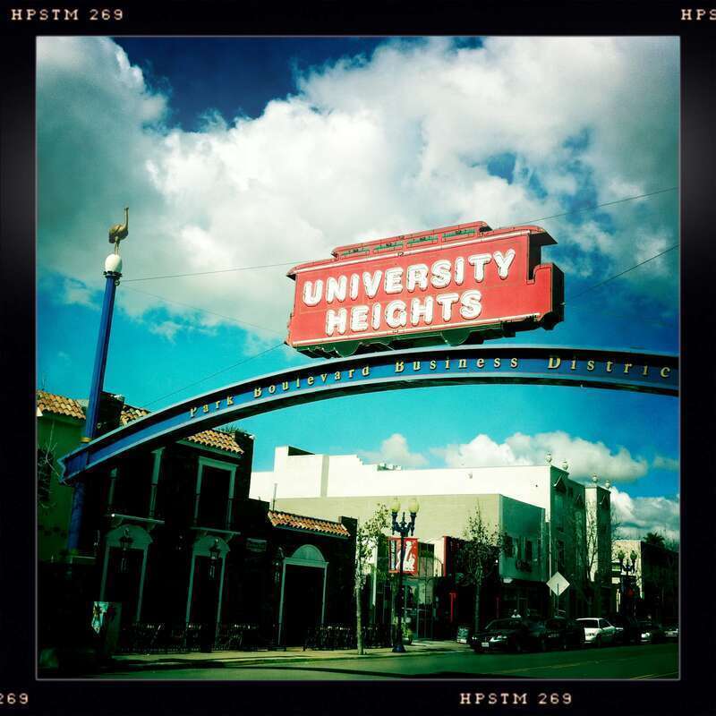 This sign is located at the corner of Madison Avenue and Park Boulevard in the University Heights neighborhood of San Diego, California. The sign was designed by public artist, Kevin Whaley.