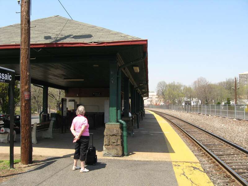 Looking north along southbound platform of en:Passaic_(NJT_station) early on a sunny afternoon in early spring.