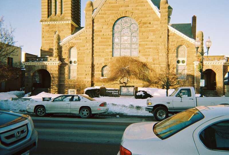The sign for the historic Congregational Church of Patchogue on East Main Street in Patchogue, New York. I wanted to capture an image of both the sign and the clock tower, but my cheap disposable camera wouldn't allow me to do that.