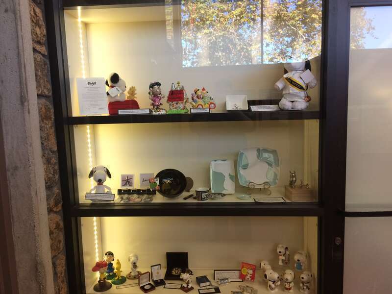 Various Peanuts statues and figurines