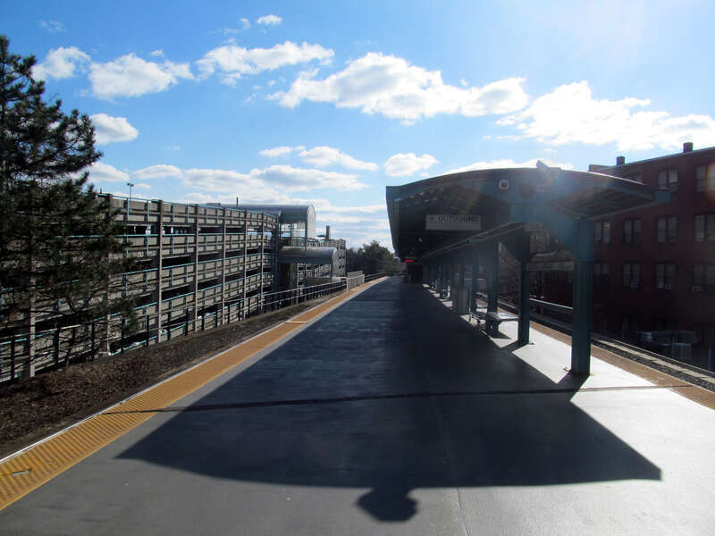 The platform and parking garage at Lynn station in April 2015