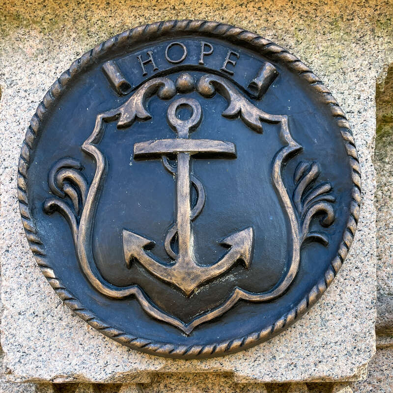 Detail of Rhode Island seal on the Roger Williams Landing Place monument in Slate Rock Park aka Roger Williams Square, Providence Rhode Island.