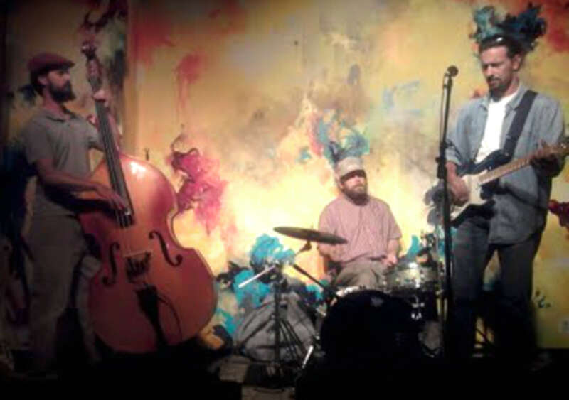 Robert St. Ours (on guitar) and Holy Bear Crossing at Clementine Cafe in Harrisonburg, Virginia on May 19, 2012.