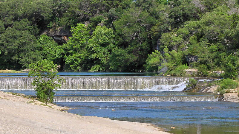 Waterfall at Blue Hole Park on the South San Gabriel River near Austin Avenue in Georgetown, Texas, United States.