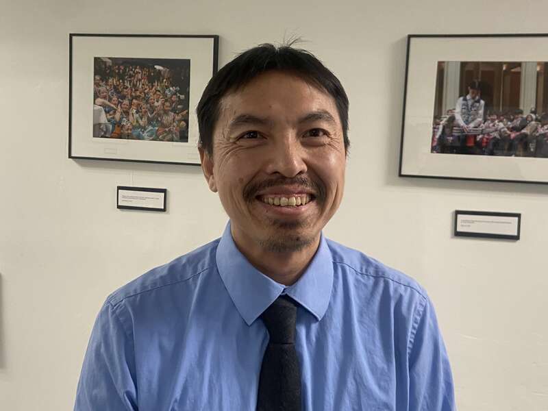 Shia Yang - Hmong Photographer/artist at his exhibition at the Hmong Museum in St. Paul, Minnesota, USA.
Photographer for the newspaper, &quot;Hmong Pages.&quot;