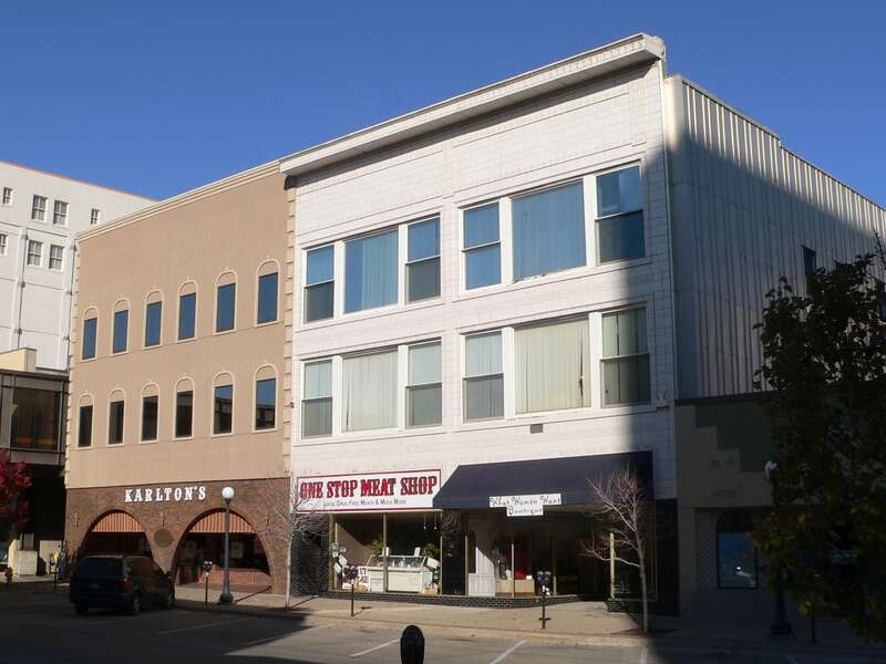 Buildings at 515 4th Street (left) and 519-521 4th Street (right) in Sioux City, Iowa; seen from the southeast.  The buildings were formerly part of the T. S. Martin and Co. department store.