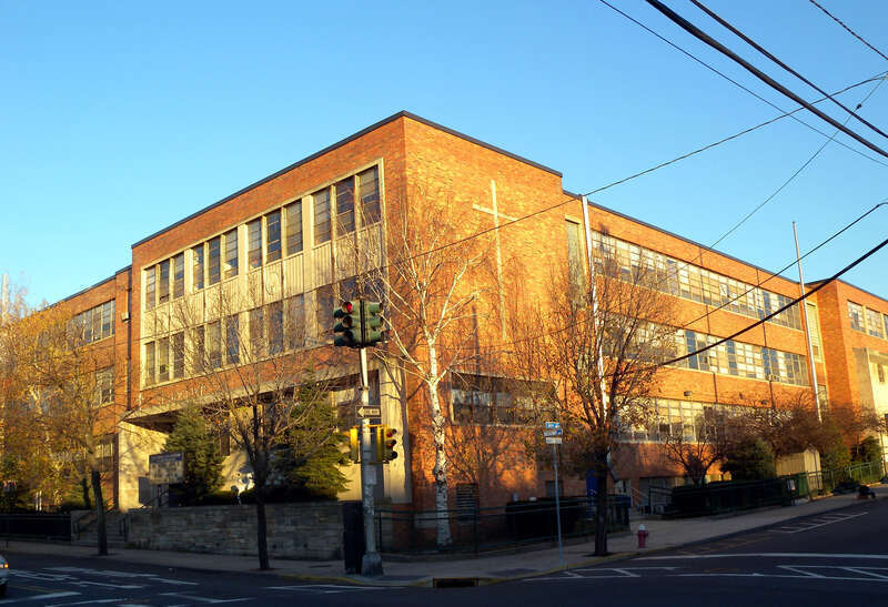 Looking east across Broadway and 54th Street at the recently closed St Joseph High School, WNY, on a sunny late afternoon.