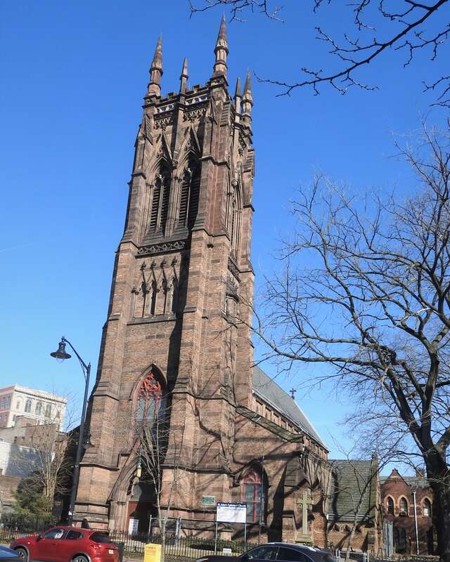 Looking east across Broad Street at church on a sunny early afternoon