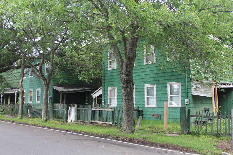 Kreischerville Workers' Houses, 4 two-family houses at 71-73, 75-77, 81-83, and 85-87 Kreischer Street in Charleston, Staten Island, New York City.  Built around 1890 to house workers of the nearby Kreischer brick manufacturing works.  Each building