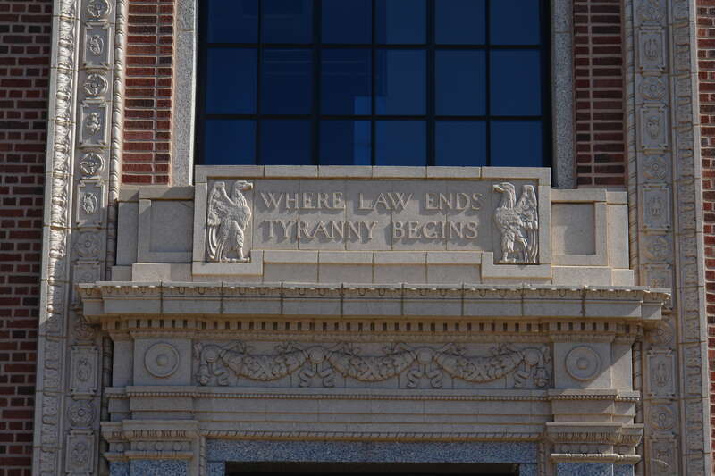 Inscription over side entrance on the western facade.