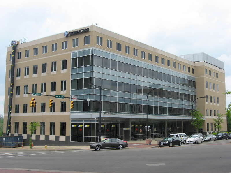 Front and southern side of the headquarters of Summacare, located at 10 N. Main Street along Market Street (State Routes 18/162) in downtown in Akron, Ohio, United States.  This building occupies the site of the Portage Hotel, which was listed on the