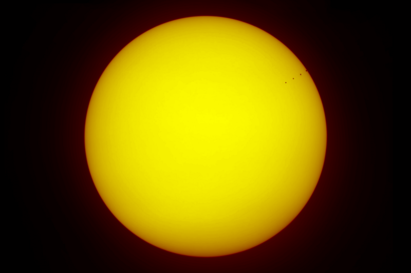 The November 2019 Transit of Mercury. Composite mosaic of 5 image stacks showing the movement of Mercury during the final ~30 minutes of transit.
The featureless Sun, free of sunspots, completely dwarfs the inner planet Mercury. The area of the Sun